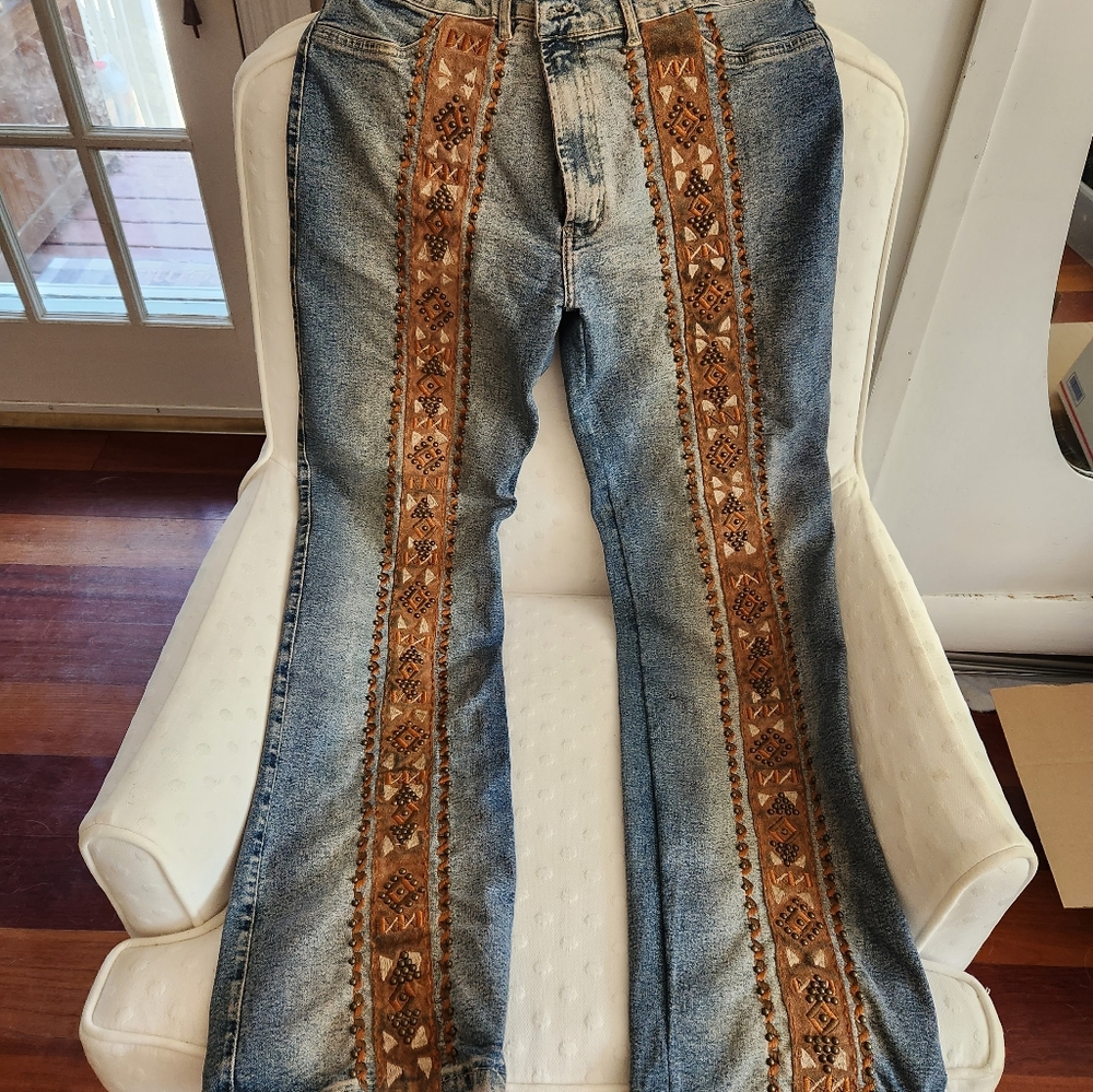 Brazil roxx jeans size 10 leather down side with rommets. Boho stretch